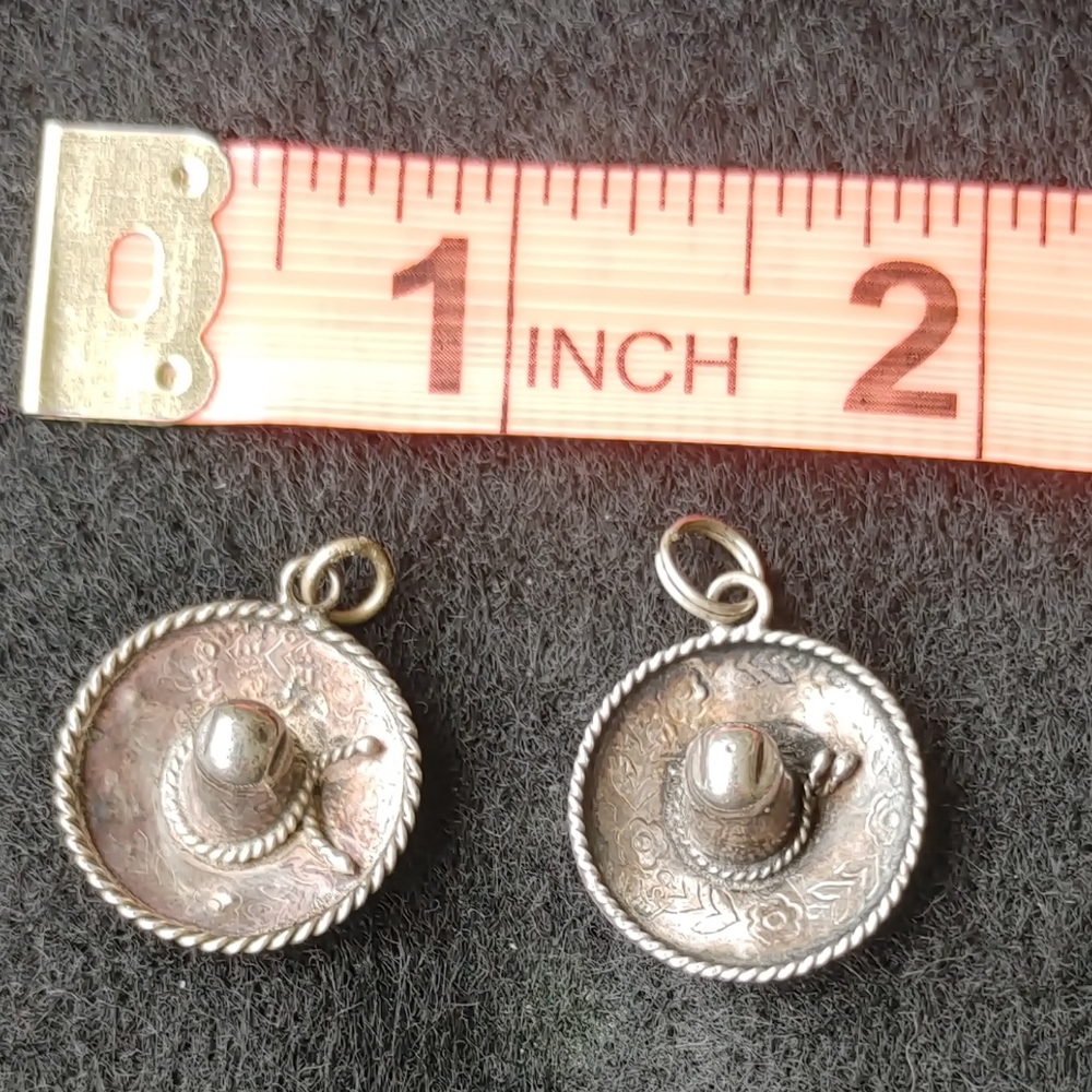 Two (2) Hat Charms